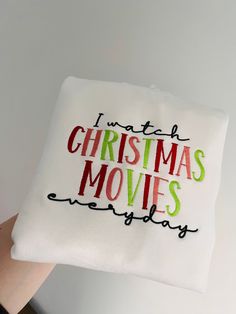 someone is holding up a pillow that says i'm not christmas movies yet?