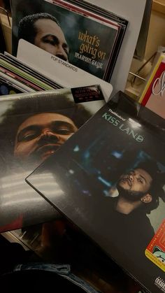 various records are stacked on top of each other