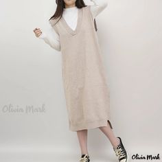 Olivia Mark - Stylish Oversized Sweater Vest Maxi Dress with Wide Neckline and Sleeveless Design Sleeveless Denim Vest For Fall, Casual Beige Sleeveless Dress, Casual Sleeveless Sweater Vest For Spring, Oversized Sleeveless Vest For Fall, Oversized Sleeveless Sweater Vest For Winter, Beige Sleeveless Sweater Vest For Winter, Casual Sleeveless Vest Dress For Spring, Sleeveless Winter Dress For Daywear, Sleeveless Fall Vest For Daywear