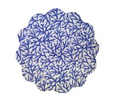 a blue and white plate with leaves on it