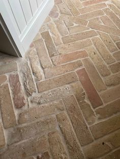 an image of a stone floor that looks like it is made out of wood and bricks