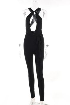 Make a bold impression with this halter jumpsuit, featuring a backless design and striking hollowed-out details. The ligature accents add a touch of sophistication, perfect for a chic, standout look. Details: Material: POLYESTER Material: SPANDEX Fabric Type: POLYESTER Size (IN) Waist Hip Thigh circumference Pant Length S 25.20-27.56 31.89-35.83 19.69-22.83 44.49 M 26.77-29.13 33.46-37.40 20.47-23.62 45.47 L 28.35-30.71 35.04-38.98 21.26-24.41 46.46 Fitted Strapless Jumpsuit For Party, Backless Jumpsuits And Rompers For Going Out, Spring Strapless Backless Jumpsuit For Night Out, Trendy Fitted Halter Neck Jumpsuits And Rompers, Trendy Fitted Halter Neck Jumpsuit, Backless Jumpsuits For Going Out, Black Halter Neck Jumpsuit For Party, Party Stretch Strapless Backless Jumpsuit, Trendy Halter Neck Jumpsuits And Rompers For Night Out