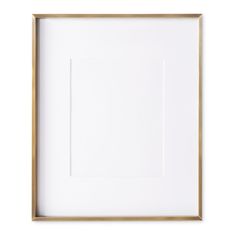 a white and gold frame on a white wall with an empty square in the middle