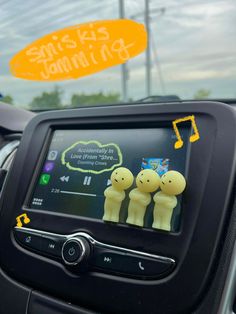 an image of a car dashboard with some stickers on it