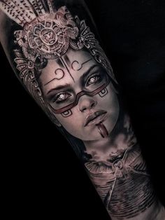 a woman's arm with a clock on it and her face painted in black and grey