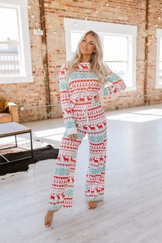 The White Nordic Christmas Pajama Set is a festive and cozy way to enjoy your holidays. The cheery pattern with classic Nordic influences will inspire holiday cheer. The ultra-soft fabric ensures comfort and warmth, making this a great set for cuddling up on a chilly winter night. Enjoy the holidays in style! Model Info: Models are 5'7", Size 2, wearing smalls Fabric: 95% polyester 5% elastane Sizes Bust Waist Hip Shoulder Sleeve_Length Length Inseam Bottoms Hem_Width Outseam Relax Relax Relax R Christmas Pj, Christmas Pajama Set, Nordic Christmas, Boutique Homes, Christmas Ornament Crafts, Winter Night, Kids Sale, Ornament Crafts, Christmas Pajamas