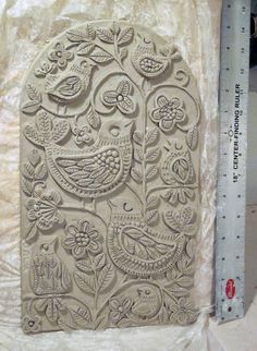 an intricately carved tile is being displayed on the app store's facebook page