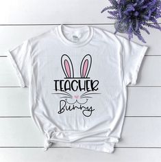 Teacher Easter shirt, Teacher bunny tee, Easter t shirt by ElainesCrafts on Etsy #easterteacher #eastershirt #teacherbunny Cute White T-shirt With Bunny Design, Cute T-shirt For Teacher Appreciation In Spring, Spring Fun T-shirt, Fun Spring T-shirt As A Gift, Fun Spring T-shirt Perfect For Gifts, Fun Spring T-shirt, White T-shirt With Funny Text For Teacher Appreciation, End Of School Year Gift T-shirt, White Pre-shrunk T-shirt