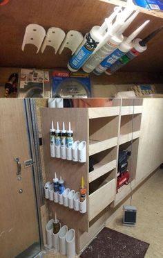 there are two shelves that have different items on them and one shelf is filled with toothpaste