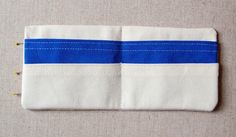 a piece of cloth with blue and white stripes