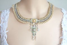 One Of A Kind Vintage Wedding ,Choker ,Necklace ,Jewelry ,Bridal ,Victorian  ,White Pearls, Crystals ,Silver,Hand Beaded, Collar ,Statement. $600.00, via Etsy. Elegant Pearl Necklace With Rhinestones For Wedding, Elegant Pearl Necklace For Receptions, Elegant Pearl Necklace For Reception, Opulent Silver Bridal Necklace For Wedding, Silver Pearl Necklace With Rhinestones For Wedding, White Jeweled Bridal Necklace For Wedding, Elegant Cream Beaded Bridal Necklace, Pearl Jeweled Necklaces For Wedding, Pearl Jeweled Necklace For Wedding