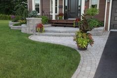 a house with landscaping in the front yard