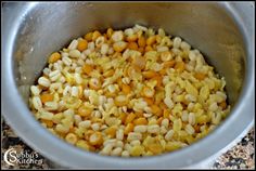 the food is being cooked in the pot on the stove