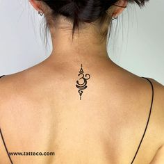 a woman with a tattoo on her back