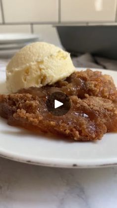 a white plate topped with food and ice cream