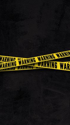 two yellow warning tapes on a black background with the words warning warning written across them