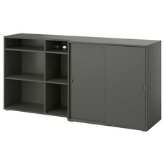 a gray cabinet with shelves and lights on the top, in front of a white background