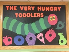 the very hungry caterpillars are on display in front of a blackboard