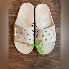 Nwt Questions? Leave A Comment Below! White Croc Sandals, White Crocs With Fur, Cozzzy Croc Sandals, Crocs Classic Cozzzy Sandal, White Sandals With Cork-bed Midsoles And Adjustable Fit, Red Crocs, Crocs With Jibbitz, Silver Glitter Shoes, Tan Wedge Sandals