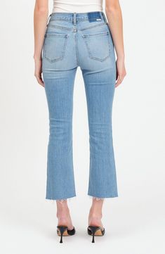 A faded wash and a raw-edge hem add to the vintage-inspired look of weekend-ready jeans cut from stretch-kissed denim. 26 1/2" inseam; 16" leg opening; 11 1/2" front rise; 15" back rise (size 29) Zip fly with button closure Five-pocket style 65% cotton, 34% organic cotton, 1% elastane Machine wash, dry flat Imported Light Wash Mid-rise Cropped Jeans, Dark Wash Mid-rise Cropped Jeans With Frayed Hem, Fall Cropped Denim Jeans With Frayed Hem, Fall Cropped Jeans With Frayed Hem, Mid-rise Cropped Jeans With Frayed Hem In Medium Wash, Faded Distressed Cropped Jeans For Fall, Fall Frayed Hem Cutoff Jeans, Fall Faded Jeans With Frayed Hem, Fall Faded Distressed Cropped Jeans