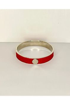 These bangles are made from our custom designed Italian leathers. They add a fun pop to your outfit and can match your bag too! Italian leather Made in New York City 18k gold plate or Rhodium plate 7/8" wide with a 2 1/2" opening - bangle does not open Leather Bangle, Gold Bangles, You Bag, Emboss, Italian Leather, Rhodium Plated, Silver Gold, York City, New York City