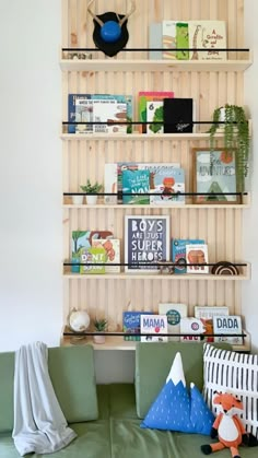 the bookshelf is made out of wood and has shelves with books on it