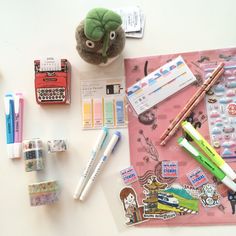 various stationery items laid out on a table