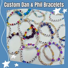 Get your #dnptit bracelets ready to trade with friends and phannies alike! This listing is for custom-made Dan & Phil themed friendship bracelets at YOUR request! Submit some D&P related words, names, or catch phrases (bonus points for obscure, chaotic, and extra silly ones) and colors of your choice, or tell me to pick from my long list of ideas, and I'll make a set of custom bracelets just for you! Bracelets are one size fits most and made from an assortment of glass, plastic/acrylic, and meta Adjustable Multicolor Jewelry With Custom Text, Adjustable Personalized Bracelets As Gifts, Personalized Adjustable Bracelet For Gift, Adjustable Personalized Bracelet For Gift, Personalized Adjustable Friendship Bracelet, Personalized Adjustable Friendship Bracelets For Gifts, Adjustable Personalized Friendship Bracelets For Gifts, Customized Adjustable Bracelets For Gift Making, Customizable Craft Supplies For Personalized Gifts