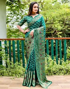 Type : Saree Saree Color : Green Blouse Color : Green Saree Length : 6.3 Mtrs (With Blouse) Blouse Length : 0.80 Mtr Fabric : Silk Work : Zari Weaving Care Instruction : Hand Wash Product Code : 33291 Green Bandhani Saree