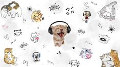 an orange cat wearing headphones and singing into the microphone with other cats around it