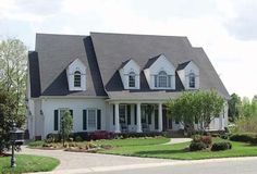 a large white house with lots of windows