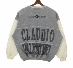 Vintage Claudio Valentino crewneck sweatshirt in grey colour. Embroidered logo on the front and at the back. Still in good condition EXCEPT some stains on the sleeve. SEE THE PICTURES FOR MORE DETAILS. CONDITION : 9/10 MEASUREMENT Pit : 27 inch Length : 26 inch Shoulder : 25 inch Arm Length : 21.5 inch Size On Tag : XL PAYMENT We accept PayPal only. The item will be ship 3-5 days once the payment has been made. SHIPPING DHL ONLY. USUALLY AROUND 7-21 DAYS BEFORE REACH THE DESTINATION. *NOTES TO B Valentino Paris, Club Sweatshirts, Vintage Jerseys, Grey Colour, Logo Embroidery, Light Jacket, Pullover Sweatshirts, Embroidery Logo, Mens Sweatshirts