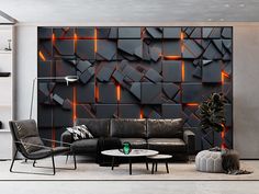 a modern living room with black walls and leather furniture