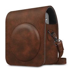 a brown leather case with a camera attached to it