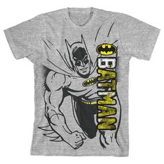 a gray batman t - shirt with the word batman on it's chest and yellow lettering