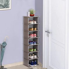 a shoe rack in the corner of a room with purple walls and white door frames