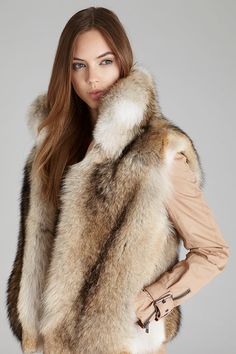 Layer our coyote fur vest with stand up collar over your fall sweater, denim jacket or winter coat for extra style and warmth. Stand up or fold down collar Slit pockets Satin lining Hook & eye closure Length: 22 in/55 cm Fur Chair, Fox Fur Vest, Fox Fur Jacket, Coyote Fur, Fabulous Furs, Fur Clothing, Fox Fur Coat, Collars For Women, Fur Fashion