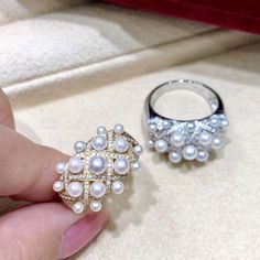 Highline: Famous Style Product Information OriginJapan MaterialAkoya Pearl, 18k Gold, and Natural Diamonds DimensionsRing Weight 7.2g Pearl Shaped: Round Size: 3-4 mm Quality: AA+ Nacre: Very Thick Color: White Luster: Very High Accessories Metal: 18k White Gold Other: 0.62ct of SI Quality Natural Diamonds Royal Ring, Akoya Pearl Ring, Royal Rings, Pearl Chandelier Earrings, Akoya Pearl Earrings, Golden South Sea Pearls, Akoya Pearls, Sea Pearls, Multi Stone Ring