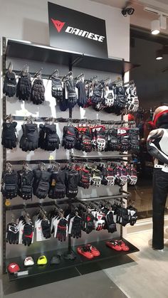 a man standing in front of a display of ski gear