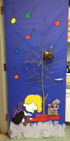 a door decorated with a charlie brown christmas tree and music notes on the front wall