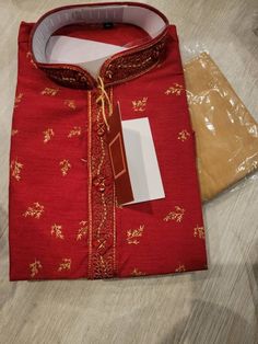 This listing is 1 full set of Kurta Pajama in specified color for Men.  Men's Kurta Pyjama with work. The sizes are available. Please measure your chest around and order accordingly. Kurta comes with pyjama made from 100% pure quality fabric with exceptionally accurate neat and durable stitching. This is Ideal for all your formal occasions. You will look natively executive anytime you put on this wear. Type :- Full Stitched Wash Care :- Dry Clean Only Wedding kurta, marriage kurta, regular kurta Fitted Sherwani For Puja During Diwali, Red Traditional Wear For Navratri Formal Occasion, Red Traditional Wear For Navratri, Bollywood Style Sherwani With Cutdana For Eid, Traditional Red Bandhgala For Eid, Red Bandhgala With Zari Work For Navratri, Bollywood Style Cutdana Sherwani For Eid, Traditional Nehru Jacket With Pallu For Festivals, Kurta With Dupatta For Puja During Eid