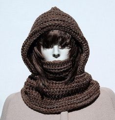 Stay cozy and stylish with this cowl winter hood made from soft wool. The scarf comes in a versatile beige knit, perfect for providing warmth during colder months. This comfortable accessory is handmade with attention to detail, making it an ideal choice for layering and providing a comfortable covering for your neck and head. Whether you're looking for a fashionable garment to complete your look or a practical weather solution, this knitted head wrap offers both style and functionality. It's th Cozy Wool Crochet Hat For Winter, Cozy Balaclava For Cold Weather And Fall, Cozy Balaclava For Cold Weather In Fall, Winter Crochet Hat With Knit Fabrication, Hand Knitted Beige Crochet Hat For Winter, Beige Crochet Yarn Hat For Winter, Beige Yarn Crochet Hat For Winter, Crochet Hat For Cold Weather And Fall, Hand Knitted Crochet Hat For Fall And Cold Weather