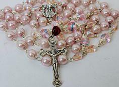 "Beautiful, handcrafted baby pink catholic rosary feat: Blessed Virgin -  Measures approximately 24\" L Peruse our shop for other great finds - https://www.etsy.com/shop/AyCarambaGifts?ref=seller-platform-mcnav Note: Shipping overages over $1 are automatically credited back to your account. All items ship immediately. If you need additional images, info please do not hesitate to contact us." Handmade Pink Rosary For First Communion, Handmade Pink Cross Rosary, Handmade Pink Rosary In Cross Shape, Handmade Pink Rosary For Baptism, Handmade Pink Rosary With Cross, Handmade Pink Rosary With Cross Shape, Pink Rosary With 8mm Beads As Gift, Handmade Pink Rosary With Round Beads, Handmade Pink Spiritual Rosary