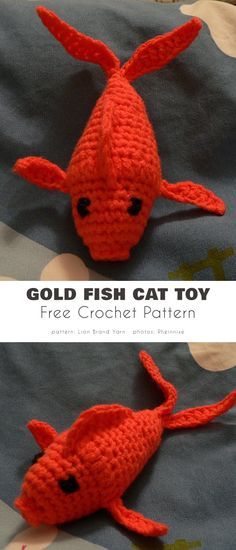 an orange crocheted fish toy laying on top of a bed