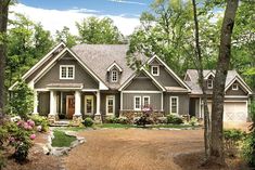 this is an artist's rendering of these country homeplans in the woods