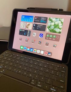 an open laptop computer sitting on top of a desk