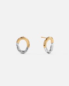 Elevate your jewelry collection with contemporary, sculptural silhouettes and understated minimalism. These molten asymmetric circle stud earrings seek inspiration from subversive-basic concepts using rich 18k gold plating and luxe texture, lightweight and versatile.

Size: 14x17.3mm
Material: 18k Gold & Rhodium Plated Modern Circle Earrings Tarnish Resistant, Modern Hammered Circle Earrings, Modern Hammered Open Circle Earrings, Circle Stud Earrings, Circle Earrings Studs, Circle Studs, Basic Concepts, Earring Necklace, Gold Plating