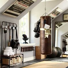 there is a boxing bag hanging from the ceiling