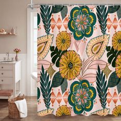 the shower curtain is decorated with colorful flowers and leaves