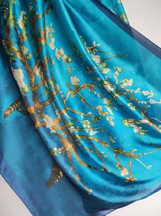 Vintage large floral silk scarf Very good condition Composition: 100% silk Dimensions: 35.4″ x 71.7″ / 90 cm x 182 cm #5282 Blue Silk Scarves For Spring, Blue Silk Scarf For Spring, Summer Silk Shawl With Floral Print, Silk Shawl Scarf For Spring, Silk Shawl Scarves For Spring, Blue Floral Print Shawl For Spring, Spring Blue Floral Print Silk Scarf, Silk Floral Print Shawl Scarves, Silk Floral Print Shawl Scarf